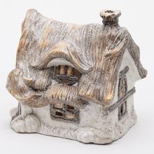 LED domček s trblietavým povrchom.