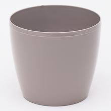 Kvetináč Magnolia v taupe farbe s okrúhlym dizajnom.