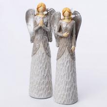 Dekoračný anjel so strieborným glitrom.