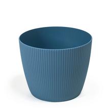 Okrúhly kvetináč Magnolia Jumper v morskej farbe.