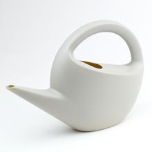 Krehká krhlička v taupe farbe s moderným dizajnom.