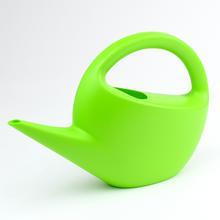 Zelená krhlička s ergonomickým držadlom.