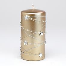 Vianočná sviečka v zlatej farbe s hviezdami