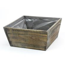 Hnedá drevená debnička s plastovým vnútrom.