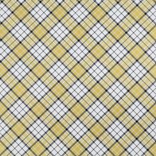 Baliaci papier s kockovaným vzorom v žltej a čiernej farbe.