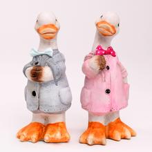 Keramické kačky v oblečení, biela farba, mix dizajnov.