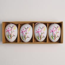 Sada plastových vajíčok s kvetinovým vzorom.