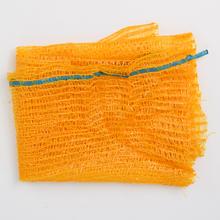 Rašlové vrece v žltej a oranžovej farbe.