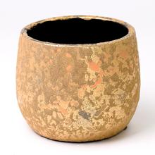 Zlatý okrúhly obal Clemente na kvetináče.