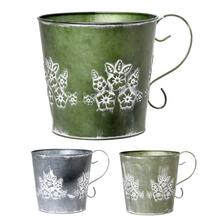 Obal s uchom z kovu v mixe farieb s kvetinovým vzorom.