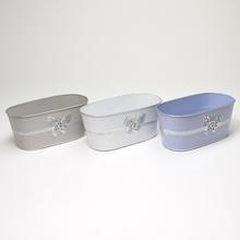 Obal oválny kovový mix s motýľom v troch farbách.