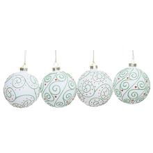 Sada sklenených vianočných gúľ v bielej, zelenej a červenej farbe.