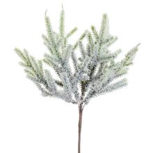 Zasnežená vetvička čečiny s dĺžkou 21 cm.