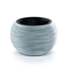 Sivý okrúhly obal na kvetináč s mrazuvzdorným dizajnom.