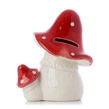 Keramická pokladnička v tvare muchotrávky.