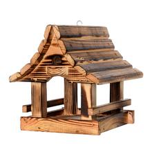 Drevené krmítko pre vtáky s rozmermi 22.5x21x26 cm.