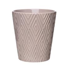 Obal na orchideu v svetlohnedej farbe s geometrickým vzorom.