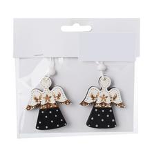 Drevené anjeliky v bieločiernej farbe, balené po dvoch.