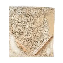 Štóla na stôl s bodkami v krémovej a zlatej farbe.