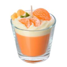 Sviečka dezert v skle s pomarančovou príchuťou.