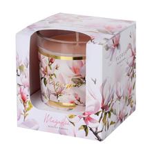 Voňavá sviečka v skle s kvetinovým dizajnom.