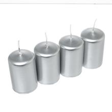 Sada štyroch strieborných adventných sviečok.
