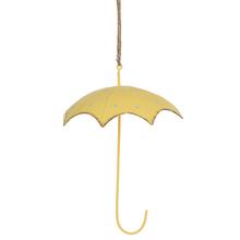 Žltý kovový závesný dáždnik s modrými bodkami.