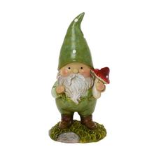 Zelený trpaslík s muchotrávkou