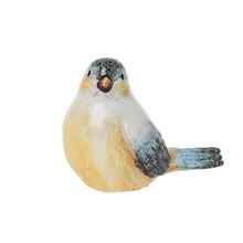 Žltomodrý keramický vták s detailným vypracovaním.