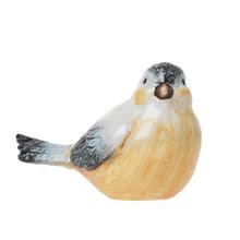 Keramický vták žltomodrej farby.