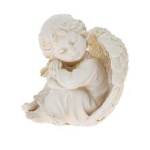 Biely smútočný anjel na podstavci.