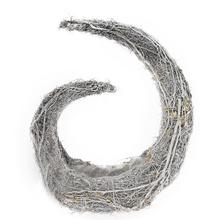 Obal Salim z prútia v tvare spirály.