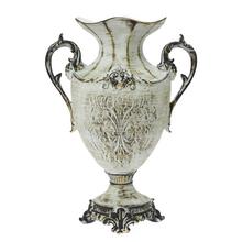 Váza vintage polyrez v zelenej farbe s dekoratívnymi detailmi.