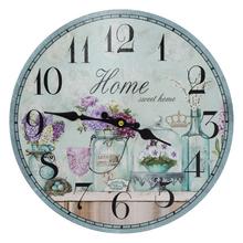 Nástenné hodiny MDF s priemerom 34 cm s motívom 'Home Sweet Home'.