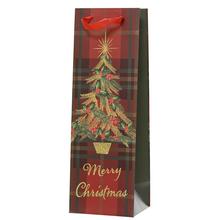 Vianočná papierová taška s motívom stromčeka a nápisom Merry Christmas.