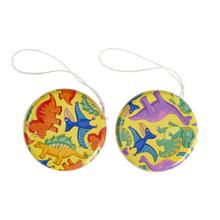 Kovové jojo s dinosaurami, priemer 5,5 cm.