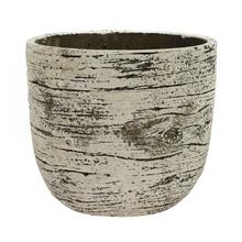 Biely kvetináč s vymývaným vzhľadom.