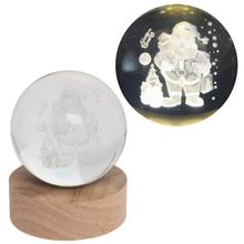 LED guľa so Santa Clausom na drevenom podstavci.