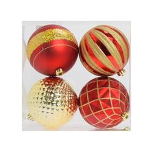 Sada štyroch vianočných gúľ v červenej a zlatej farbe.