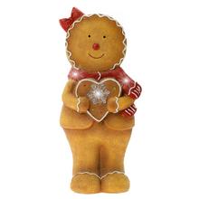 Keramický perníček so srdcom, hnedý, s červenou mašľou.