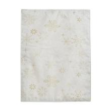 Prestieranie s krémovo-zlatými vločkami.