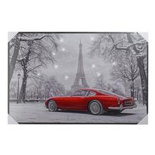 Obraz červeného auta pred Eiffelovou vežou v Paríži.