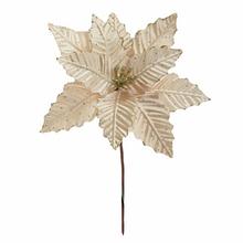 Vianočná ruža v šampanskom odtieni s dekoratívnymi detailmi.