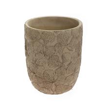 Obal na kvety z keramiky v béžovej farbe.