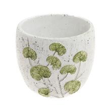 Obal na rastliny z keramiky s bielo-zeleným dizajnom.