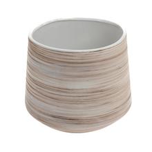 Obal z keramiky s pruhmi v krémovej farbe.