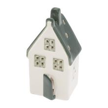 Porcelánový domček v bielej a zelenej farbe.