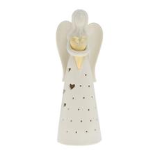 Biely porcelánový anjel so zlatým srdcom.