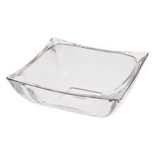 Misa sklo s čírym povrchom a zlatým okrajom.