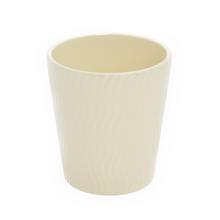 Obal na orchideu krémovej farby s vlnkovým vzorom.